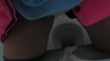 Chubby milf pissing and masturbating in a public toilet. Then, she smokes a cigarette outdoors near a large spruce. Amateur fetish. - xvideos.com - Russia